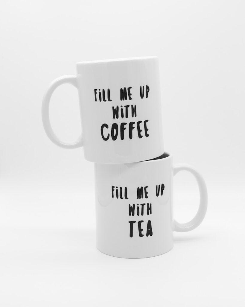 two white ceramic mugs
