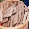 person holding Mr & Mrs enveloped lot