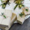 four gift boxes under Christmas tree