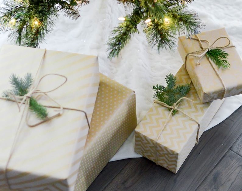 four gift boxes under Christmas tree